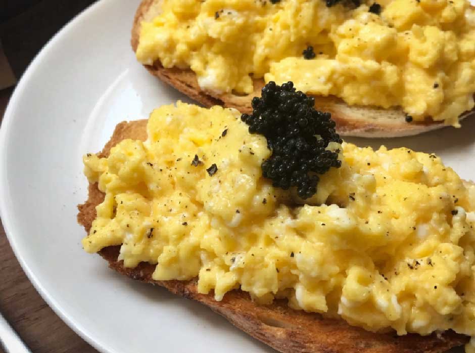 Poached Egg on Toast with Caviar and Truffle Cream